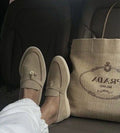 Lo loafers sued