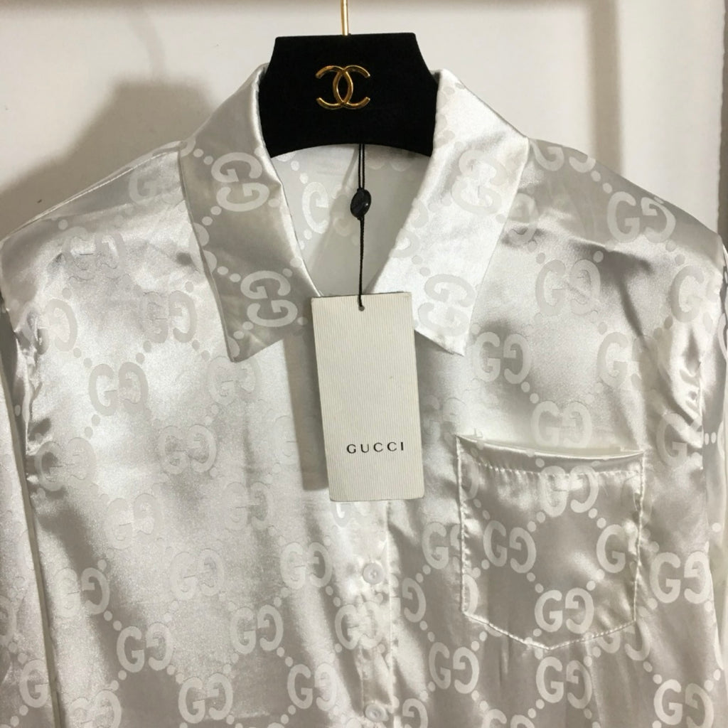 Satin blouse logo