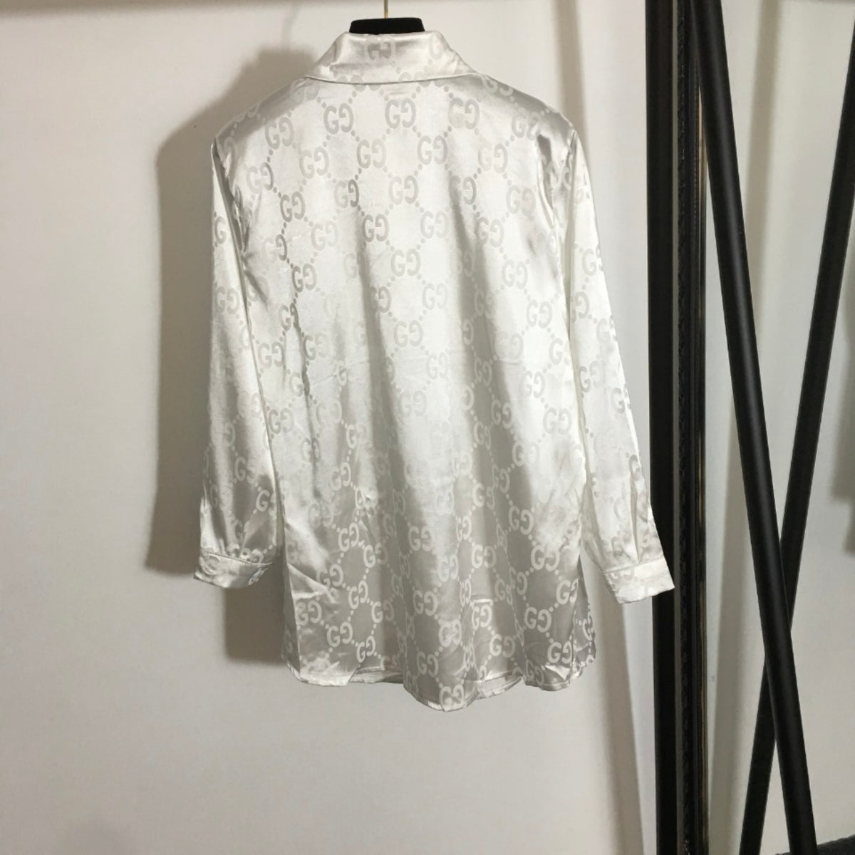 Satin blouse logo